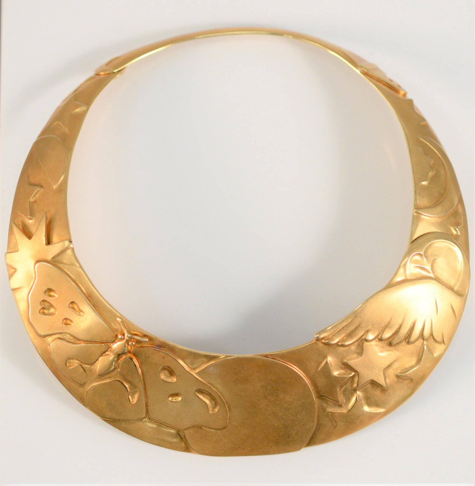 Angela Cummings for Tiffany & Company 18 karat gold: Angela Cummings for Tiffany & Company18 karat gold nocturnal design collar necklace with owl, moth, stars, and moonsbeing sold with Tiffany & Company letterregistry #57/23095 from 1983 with Tiffany 14