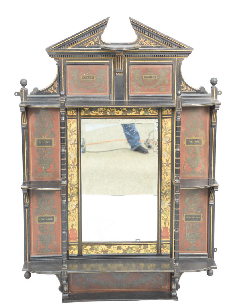 Ebonized Hanging What-Nut Shelf with painted: Ebonized Hanging What-Nut Shelfwith painted backgrounds marked Wedgwood, Minton, Faience, etc.height 53 inches, width 37 inches, depth 7 inches