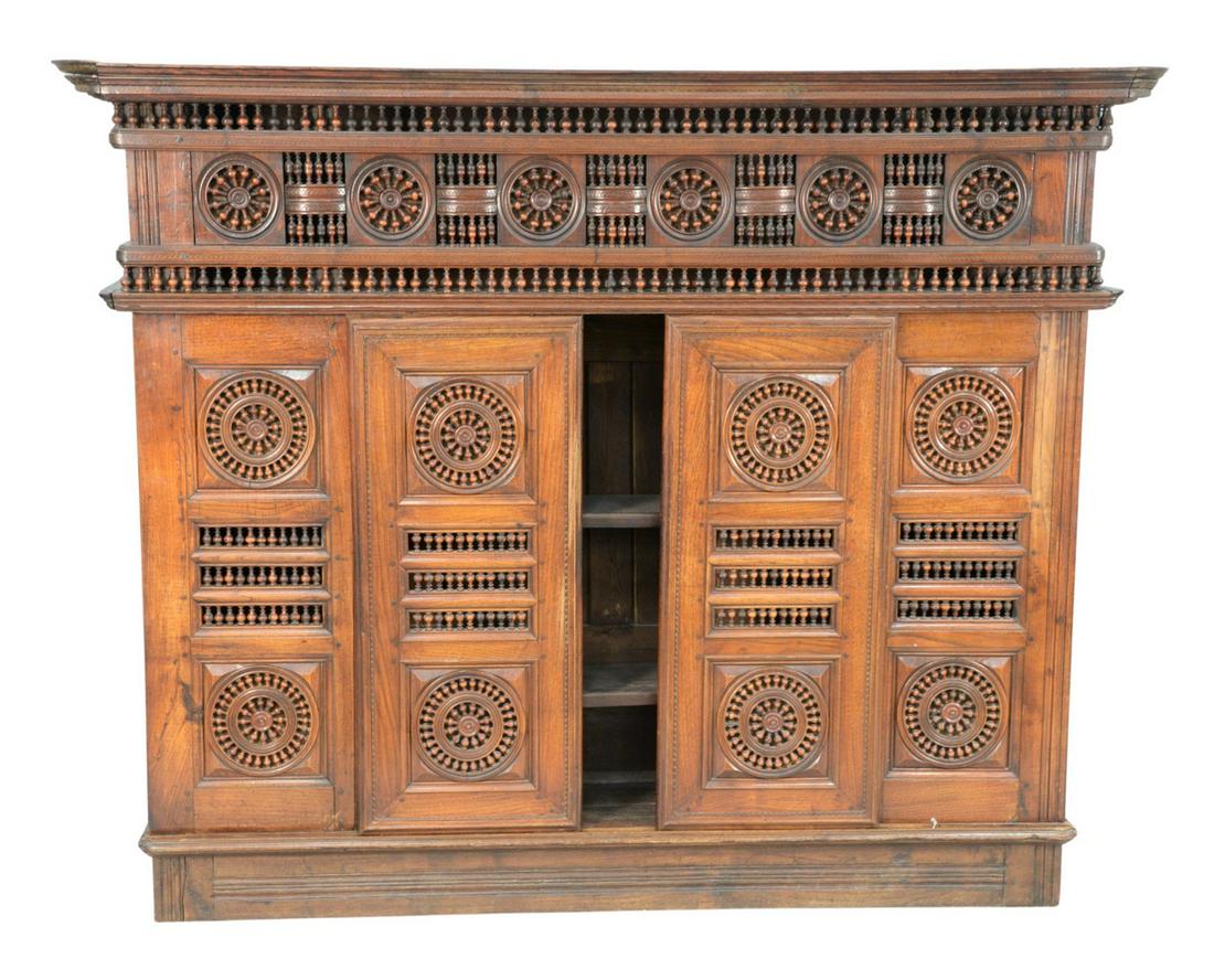 Walnut Two Part Cabinet with sliding doors, and carved: Walnut Two Part Cabinetwith sliding doors, and carved spindleslate 18th century - early 19th century, possibly Moorish or Frenchheight 63 1/4 inches, width 78 1/2 inches, depth 15 1/2 inches