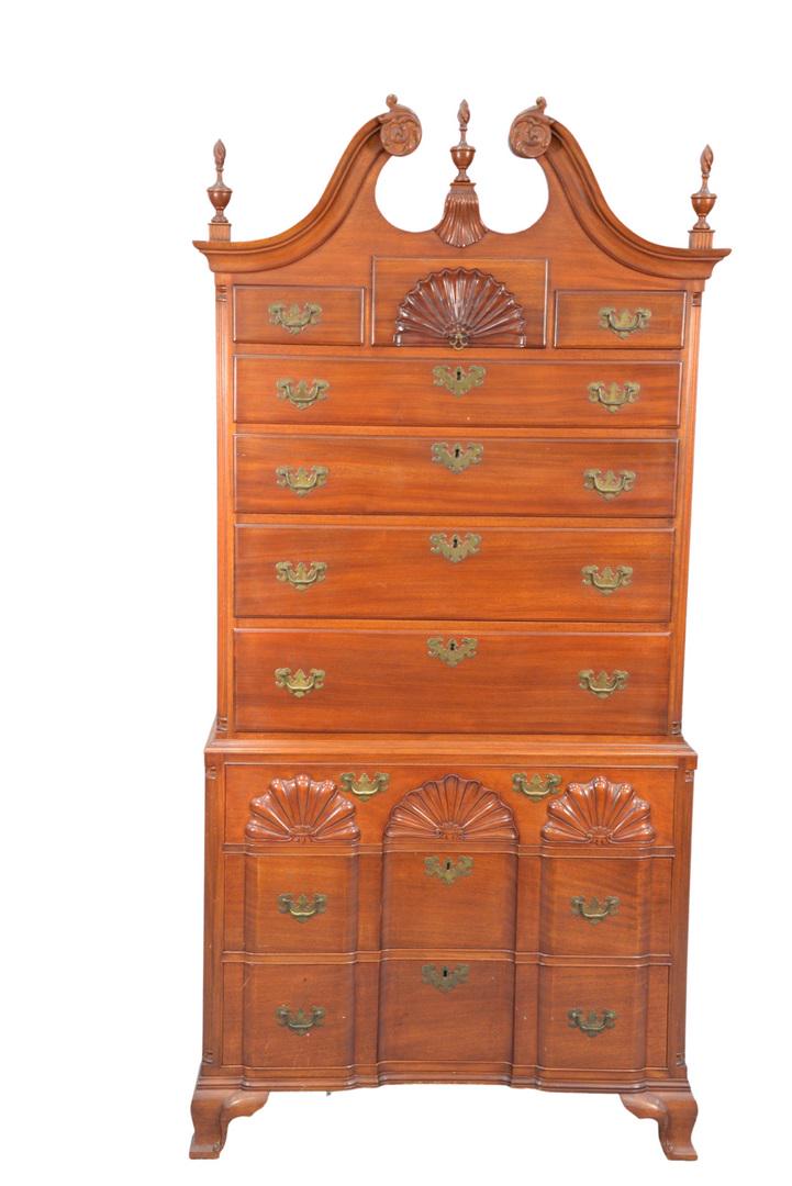 Fineberg Custom Mahogany Chest on Chest in two parts,: Fineberg Custom Mahogany Chest on Chestin two parts, upper section having broken arch top, over three drawers, one having shell carving, over four drawers on lower section, with triple shell carved bl
