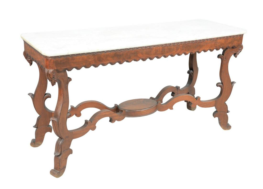 Victorian Hall Table having white marble top, frame: Victorian Hall Table having white marble top, frame with ripple moulding set on scrolled legsattributed to Meeksheight 33 inches, top 20 3/4" x 60 1/2"