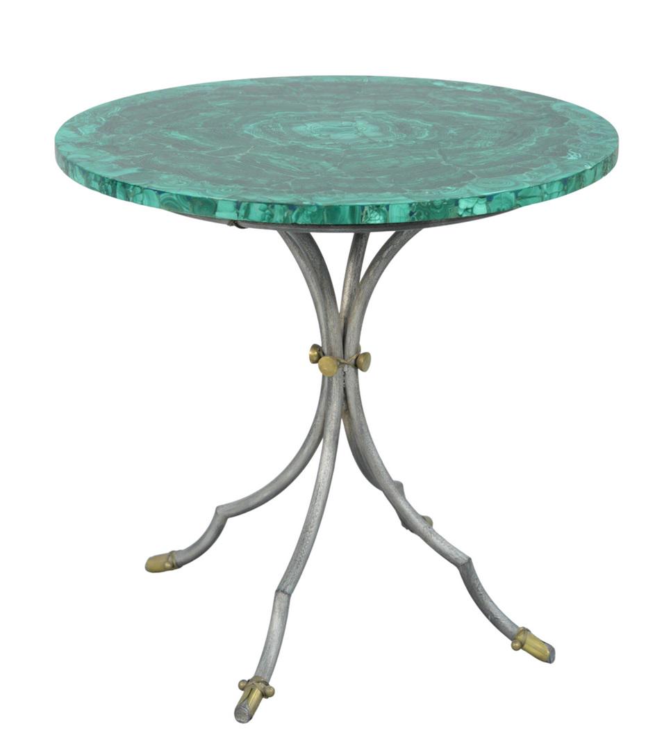 Malachite Top Round Table with iron brass trimmed base: Malachite Top Round Table with iron brass trimmed base, height 24 inches, diameter 25 1/2 inchesProvenance: The Estate of Alina Roisen, Park Avenue, New York