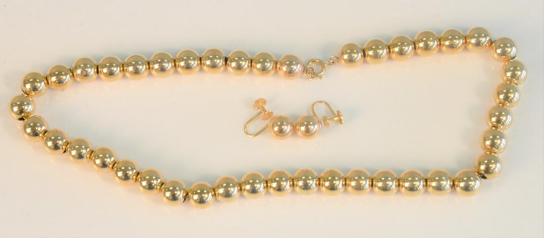 Three piece lot to include; 14K gold bead necklace and (1 of 3)