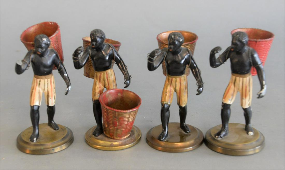 Four Blackamoor Figures  carrying baskets to be (1 of 3)