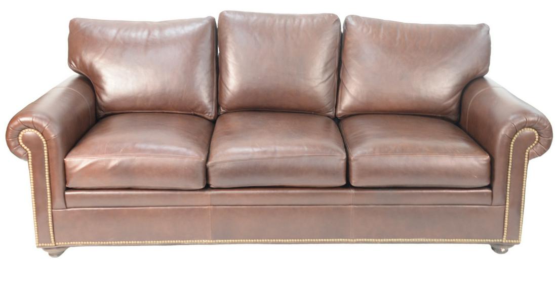 Two Piece Lot, to include Ethan Allen brown leather: Two Piece Lot, to include Ethan Allen brown leather sofa, along with leather reclining chair (as is), height 30 inches, length 86 inches.