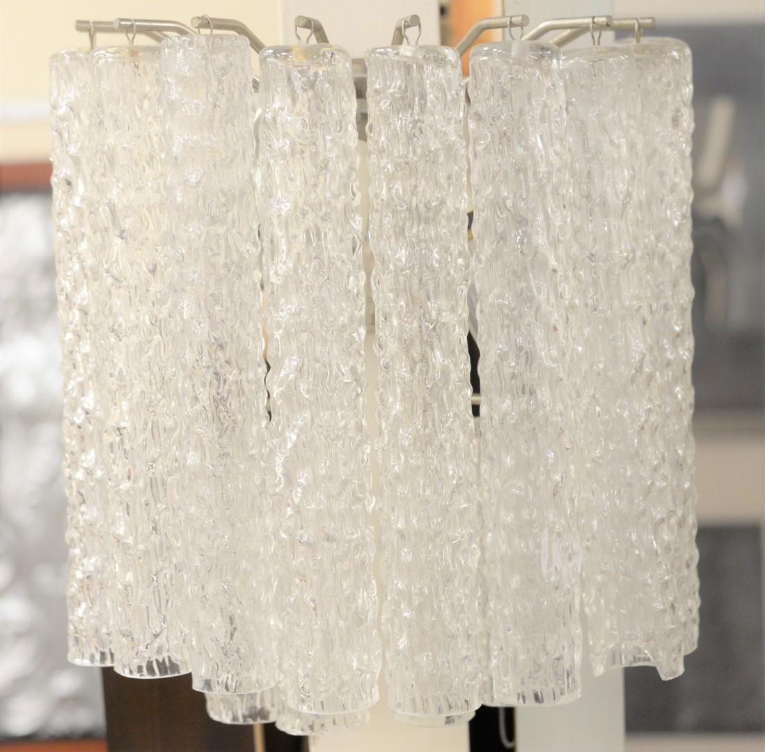 Pair of Murano Venini Wall Sconces, Mid-Century glass: Pair of Murano Venini Wall Sconces, Mid-Century glass and chrome, each having three lights and hanging crystal, height 13 inches, width 12 inches. Provenance: The Estate of Alina Roisen, Park Avenue, 