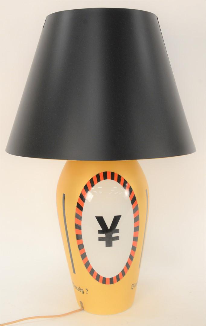 Philippe Starck Greedy Table Lamp, hand painted with: Philippe Starck Greedy Table Lamp, hand painted with three panels, having Euro dollar and yen, overall height 31 1/2 inches.