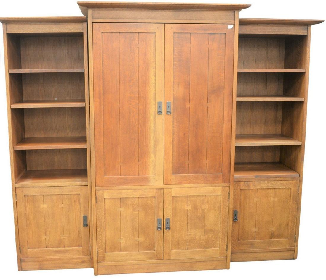 Stickley Mission Oak Entertainment Center, in three: Stickley Mission Oak Entertainment Center, in three parts, with adjustable shelves, side cabinets height 78 inches, width 24 inches, center height 81 inches, width 43 inches, all plus moldings.