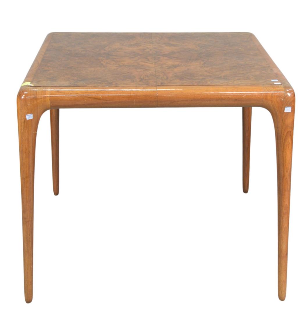 Vladimir Kagan Card Table, having burled top with: Vladimir Kagan Card Table, having burled top with walnut base, stamped Kagan on bottom, with one 27 3/4 inch leaf, height 28 inches, top 34" x 34", open 34" x 61 3/4". Provenance: The Estate of Alina 