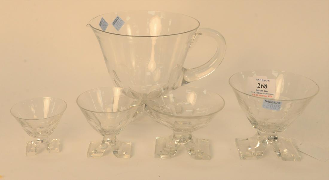 Set of 37 Crystal Stem Glasses, to include a set of 10: Set of 37 Crystal Stem Glasses, to include a set of 10 red wine; 6 white wine; 11 champagne; and 10 cordials, along with a pitcher, possibly Baccarat, 2 1/2"; 2 3/4"; 2 3/4"; 3 3/4"