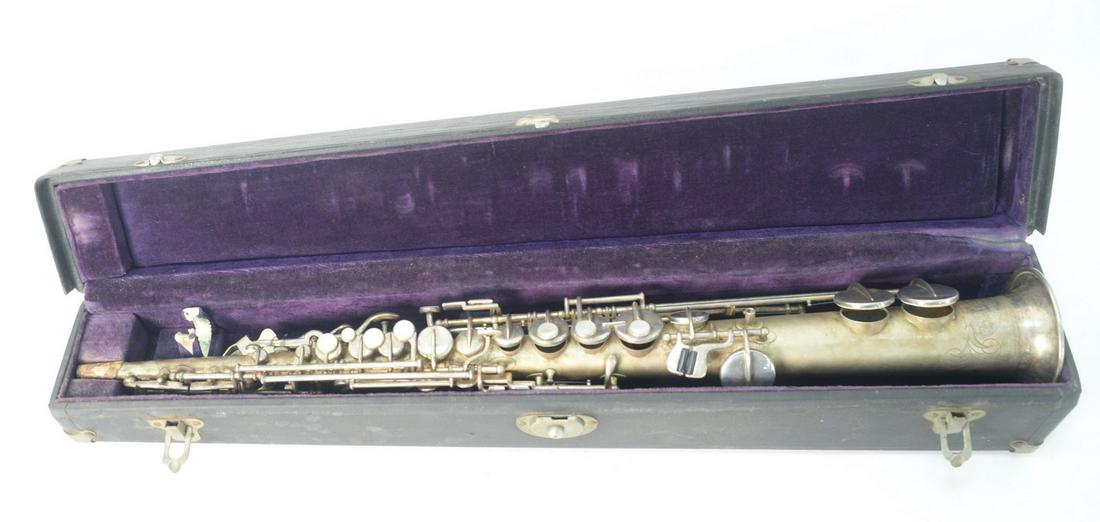 1926 Buescher True Tone Soprano Saxophone, serial: 1926 Buescher True Tone Soprano Saxophone, serial #205429, pads and springs in good shape no mouthpiece, needs new corking, original hard-shell case, case length 26 1/2 inches.