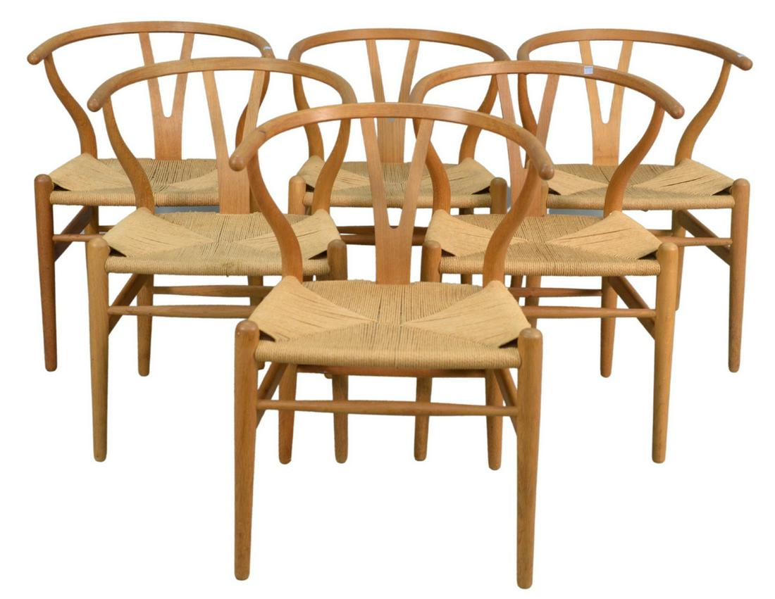 Set of Eight Carl Hansen Wishbone Armchairs, marked: Set of Eight Carl Hansen Wishbone Armchairs, marked Carl Hansen, after Hans Wagner, height 27 1/2 inches.