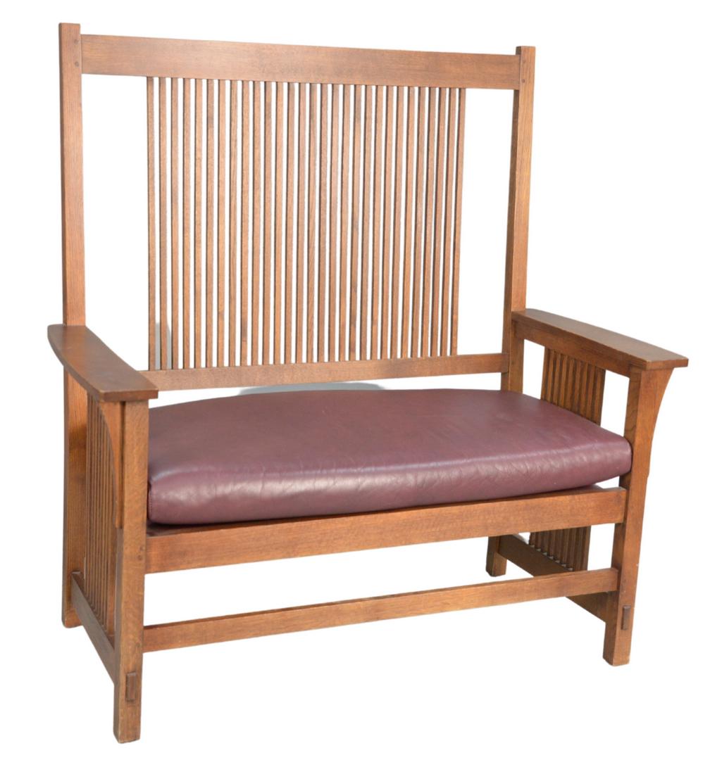 Stickley Mission Oak Bench, with high back and leather: Stickley Mission Oak Bench, with high back and leather cushion, height 49 inches, width 48 inches.