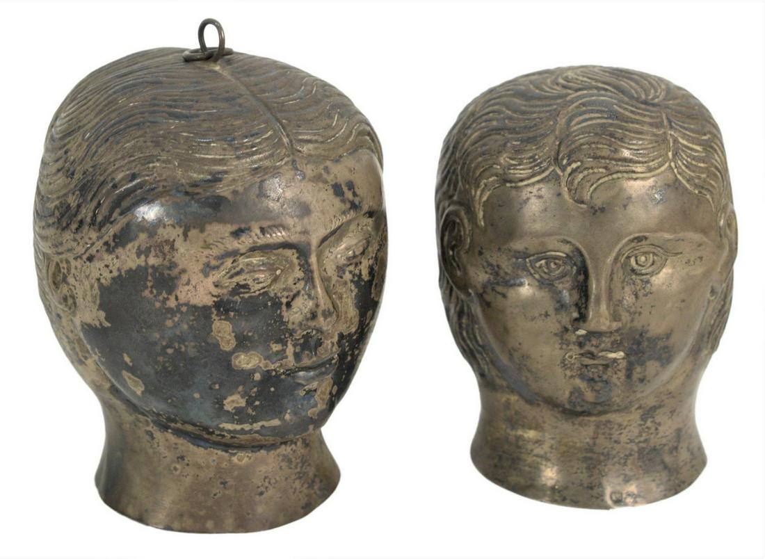 Pair of Silver Heads in the form of a man and woman, (1 of 3)