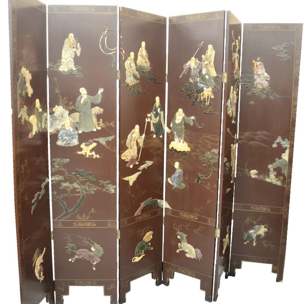Six Fold Chinese Screen having stone and bone raised: Six Fold Chinese Screen having stone and bone raised immortals, landscape, and animals, height 86 inches, length 108 inches.