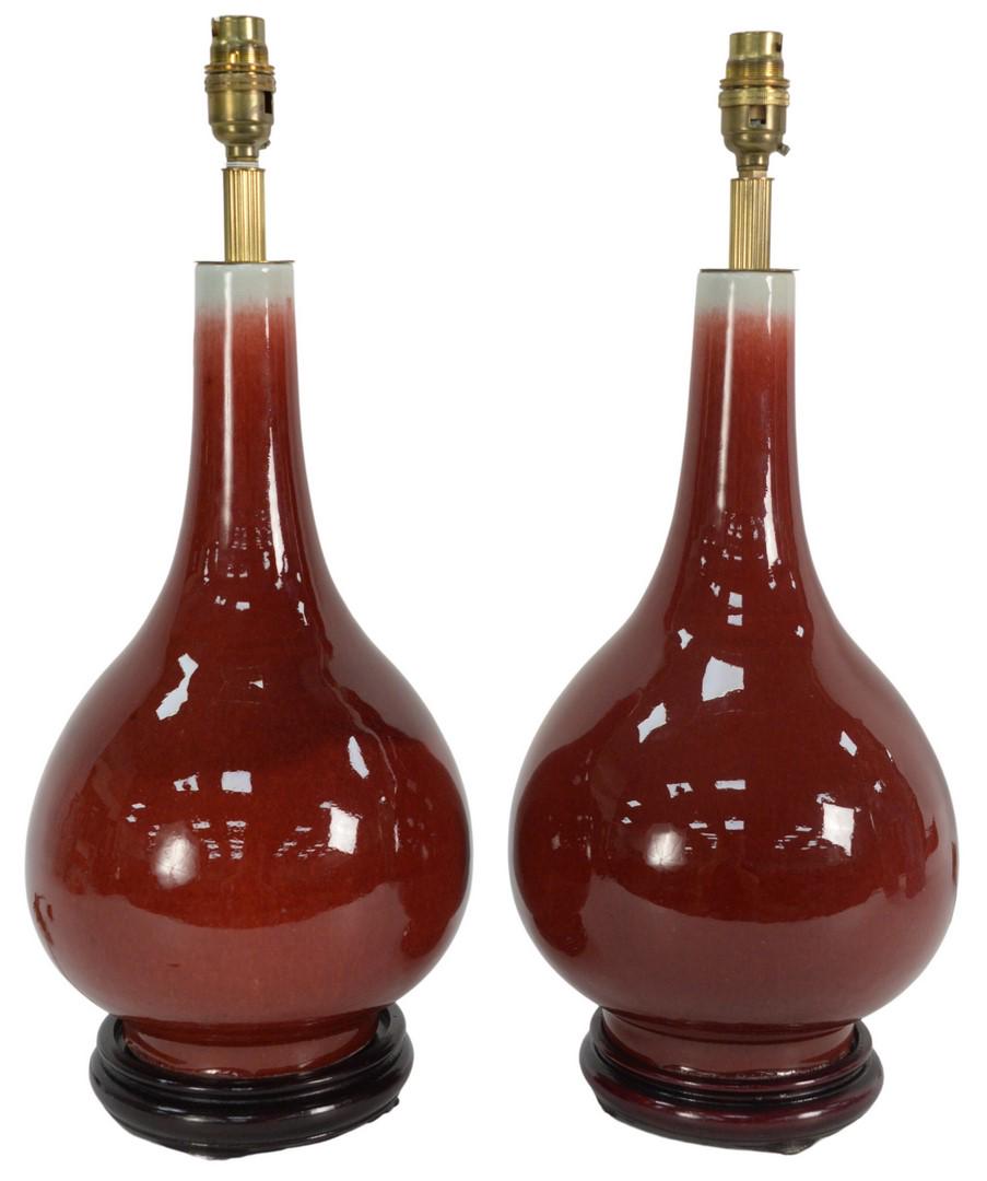Pair of Oxblood Vases on black wood bases drilled into (1 of 4)