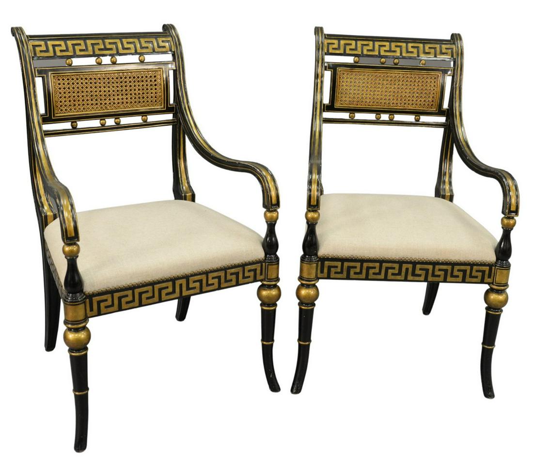 Pair of Black and Gilt Regency Style Armchairs, having: Pair of Black and Gilt Regency Style Armchairs, having newly upholstered seats, height 40 inches, width 23 inches, depth 20 inches.