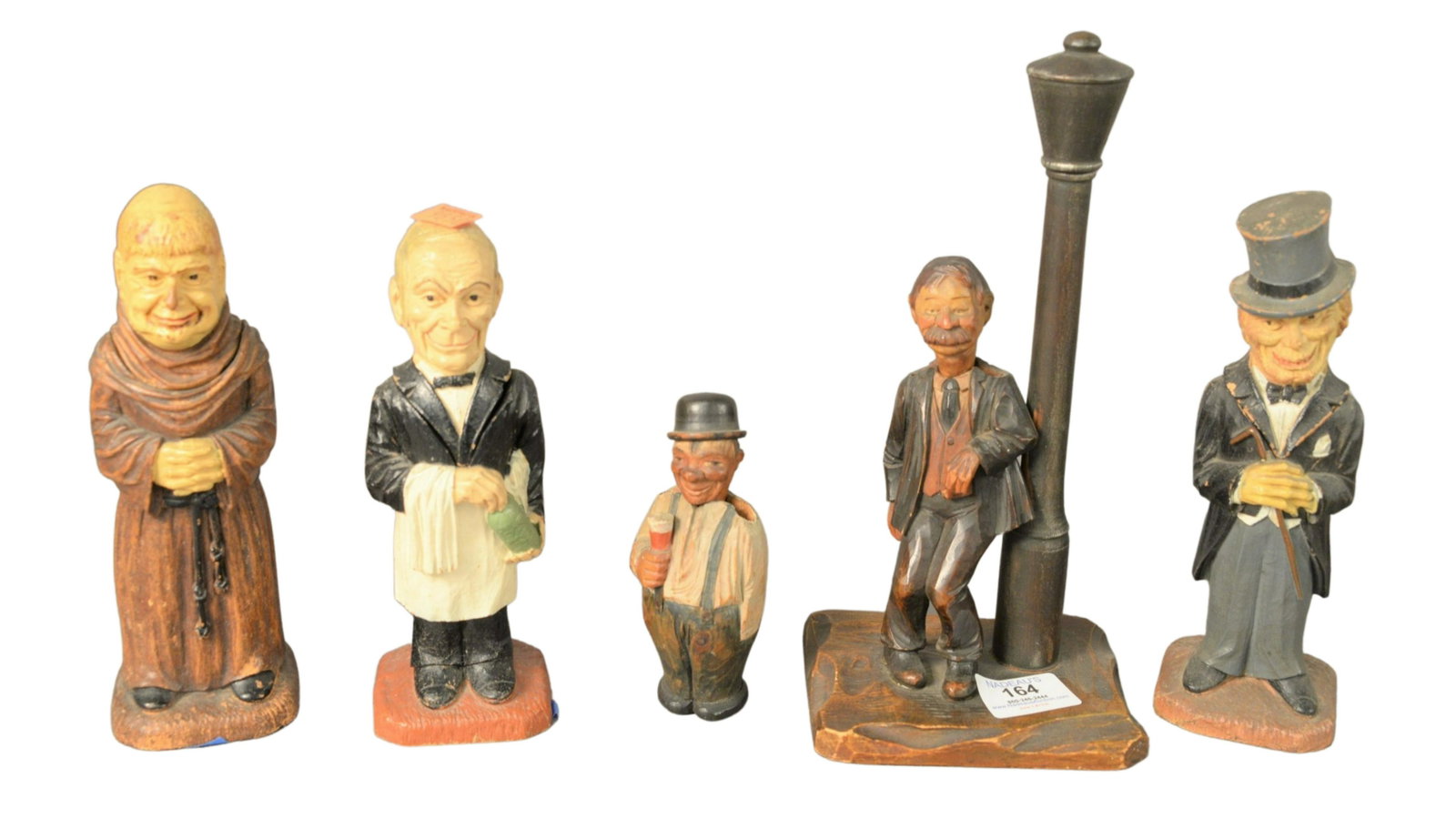 Group of Five Carved and Painted Wood Folk Floral: Group of Five Carved and Painted Wood Folk Floral Corkscrews and Bottle Openers, tallest height 10 1/2 inches.