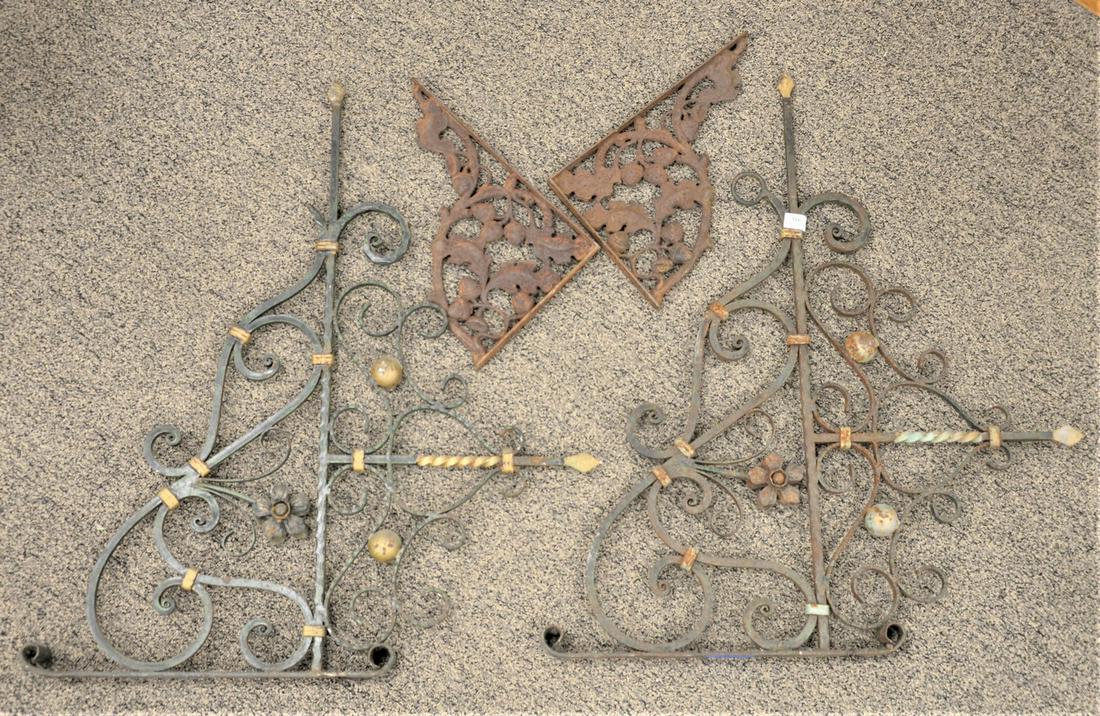 Pair of Wrought Iron Brackets, height 39 inches, length: Pair of Wrought Iron Brackets, height 39 inches, length 28 inches.