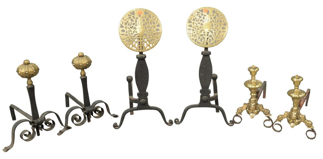 Seven Piece Lot to include three pairs of andirons, two: Seven Piece Lot to include three pairs of andirons, two iron, brass fire fender with fire grate, and one brass, heights 13, 16 and 24 inches.