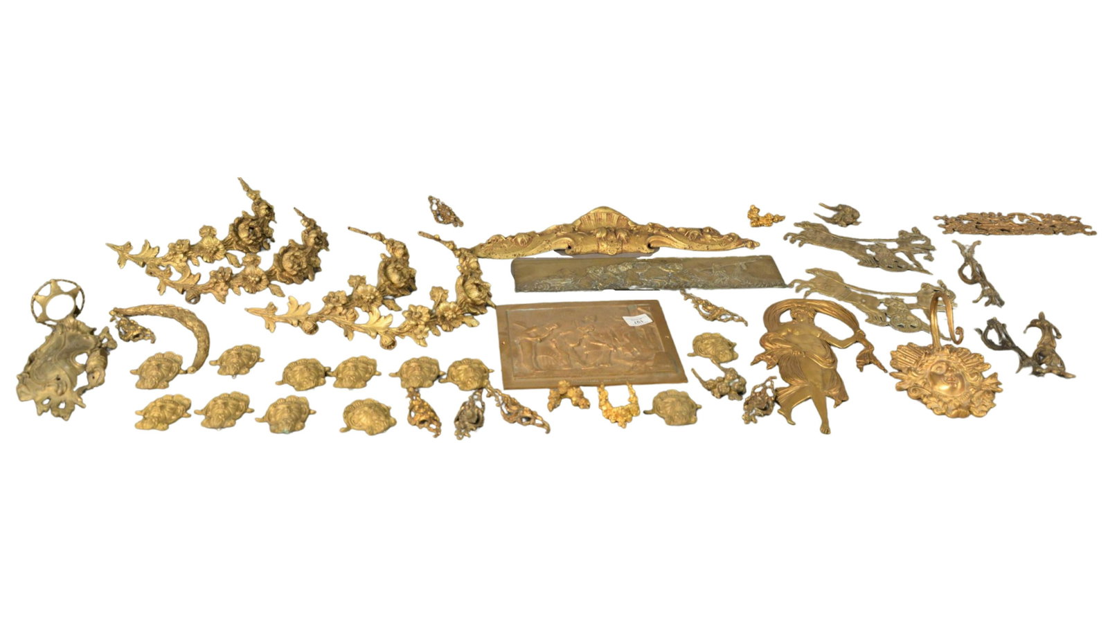 Large Lot of Wall Hangings, to include gilt bronze plaq: Large Lot of Wall Hangings, to include gilt bronze plaques, ormolu mounts, two carved plaques, a pair of chariots, several in the form of flowers, etc.