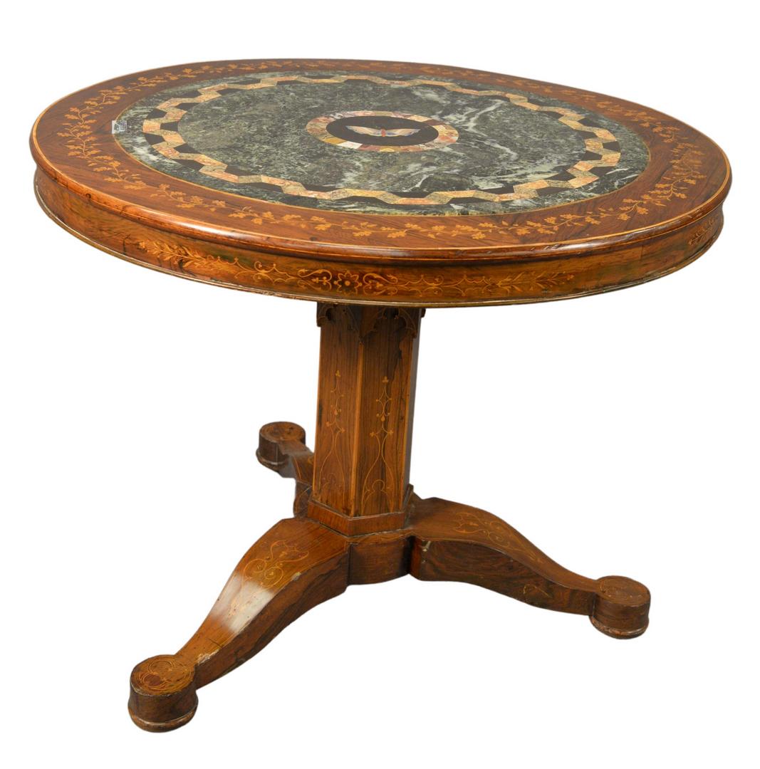 Rosewood Round Center Table having center pietra dura: Rosewood Round Center Table having center pietra dura top and vine inlaid surround on pedestal, on three inlaid legs, height 29 inches, diameter 36 1/2 inches.