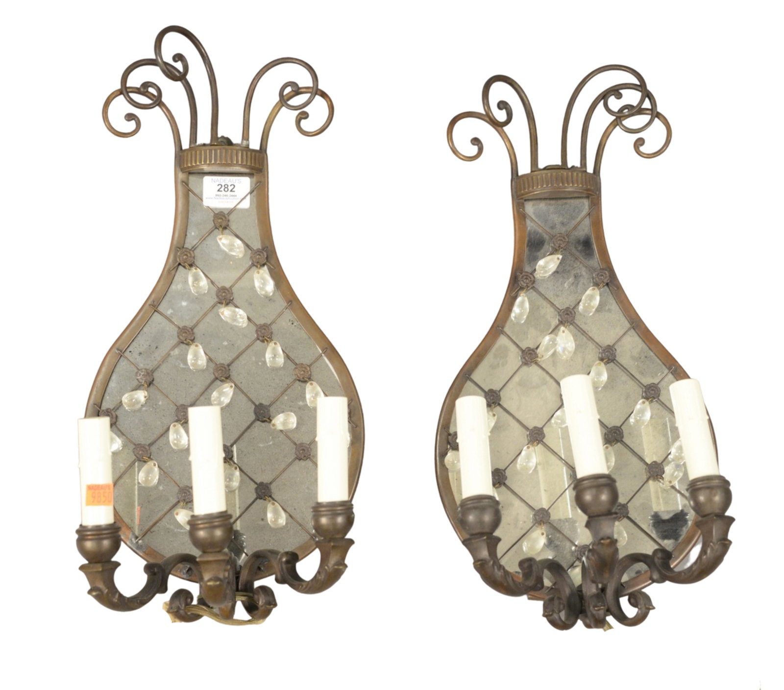 Pair of Bronze, Crystal, and Mirror Back Three Light: Pair of Bronze, Crystal, and Mirror Back Three Light Wall Sconces, height 19 inches, width 8 1/2 inches.