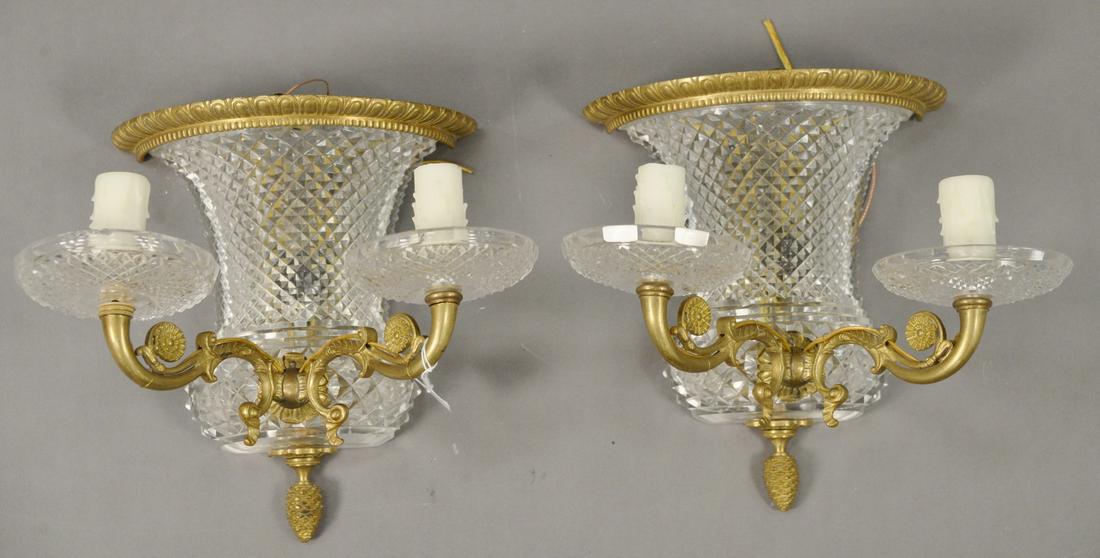 Pair of Empire Gilt Bronze and Cut Glass Urn Form Two: Pair of Empire Gilt Bronze and Cut Glass Urn Form Two Light Wall Sconces, having scrolling arms, height 10 1/2 inches, width 9 1/4 inches.