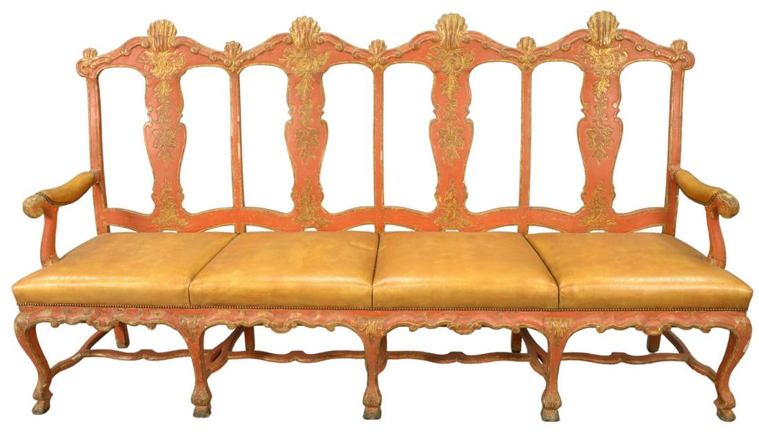 Four Seat Settee, red with gilt, having openwork back,: Four Seat Settee, red with gilt, having openwork back, leather upholstered seats on carved legs, probably Venetian, 18th century, height 43 inches, length 87 inches, depth 18 inches.