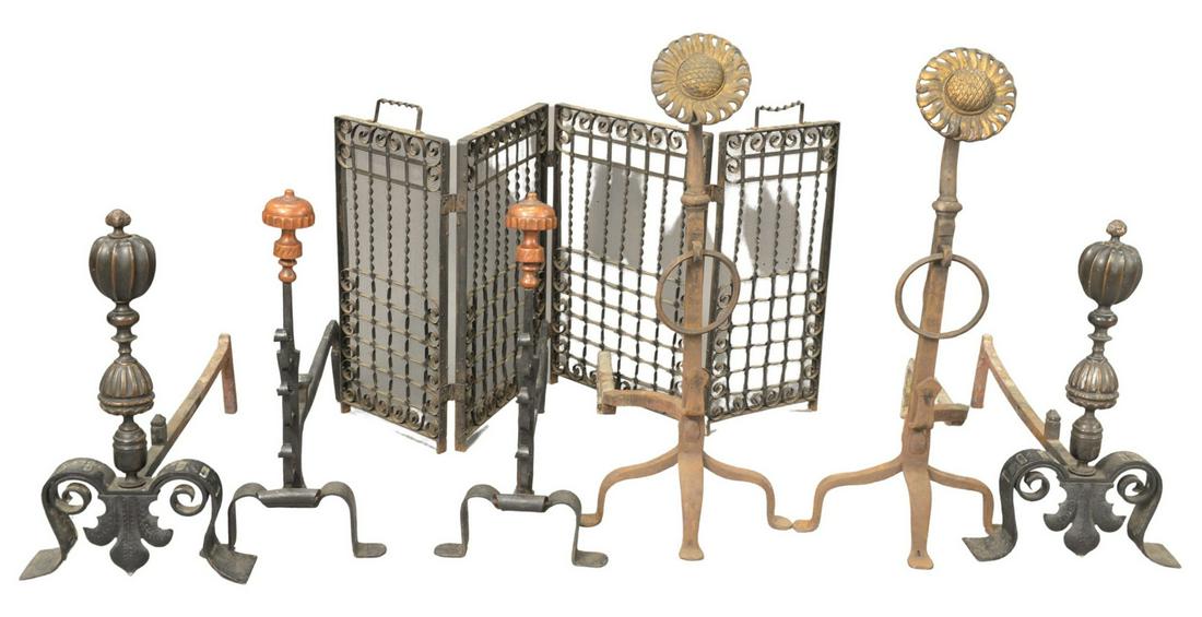 Seven Piece Lot, to include a pair of iron andirons: Seven Piece Lot, to include a pair of iron andirons with sunflower tops; a small fire screen; two brass and iron andirons (one top ball missing); along with a brass pair of andirons; sunflower height 