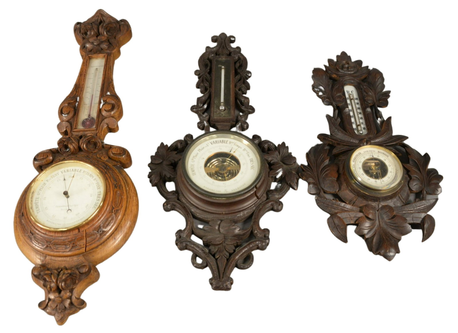 Three French and German Carved Wood Barometers, longest: Three French and German Carved Wood Barometers, longest 24 inches.
