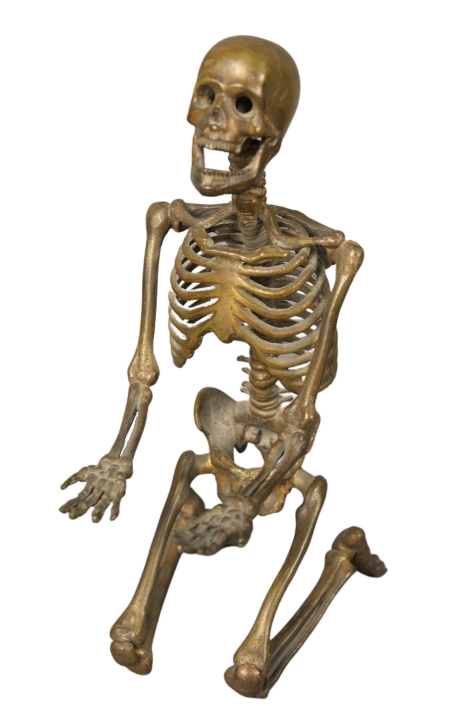 David Dempsey (American, 20th century), kneeling: David Dempsey (American, 20th century), kneeling skeleton, bronze with brown patina, initialed and dated on the hip: DWD '89; height 7 3/4 inches.