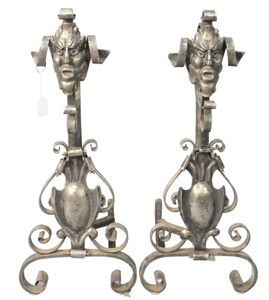 Pair of Iron Andirons with Faces, height 29 inches.: Pair of Iron Andirons with Faces, height 29 inches.