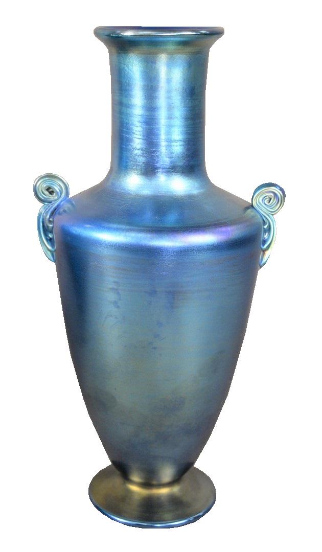Tiffany Studios Blue Favrile Glass Vase, having a: Tiffany Studios Blue Favrile Glass Vase, having a cylindrical neck and two small scroll handles mounted to the shoulder, height 12 inches.