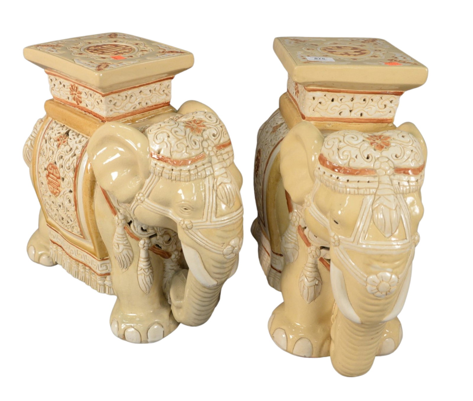 Pair of Glazed Ceramic Garden Seats, in the form of: Pair of Glazed Ceramic Garden Seats, in the form of elephants, height 17 inches, length 20 inches, width 7 1/2 inches.