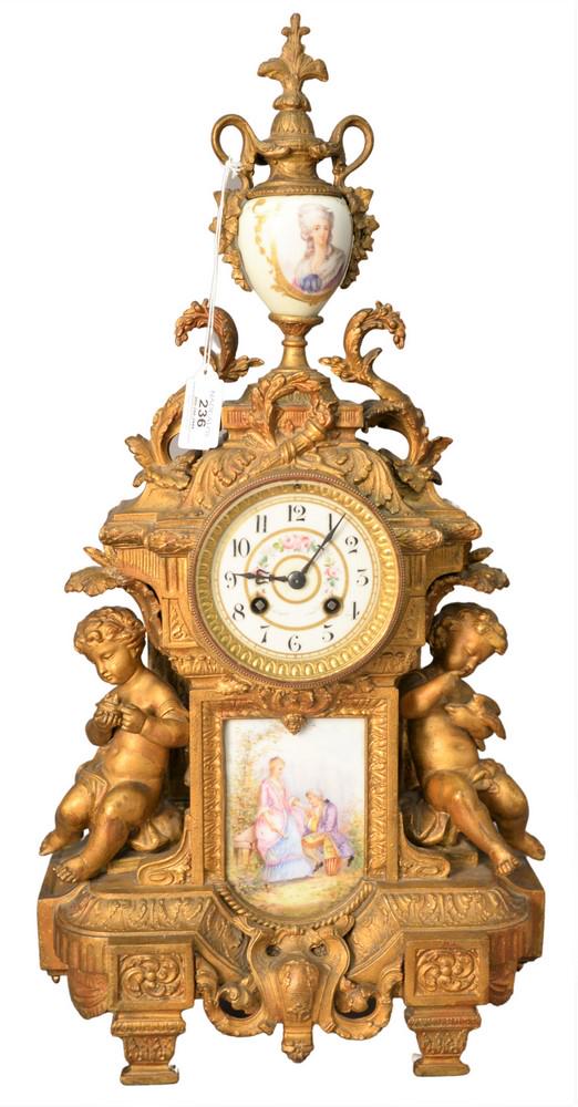 French Style Figural Mantle Clock, having two putti (1 of 7)