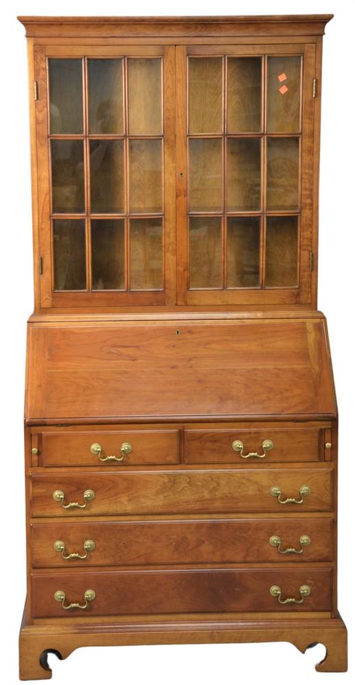 Stickley Cherry Two Part Secretary, having fitted: Stickley Cherry Two Part Secretary, having fitted interior with paper labels in drawer, height 75 inches, width 36 inches, depth 20 inches.