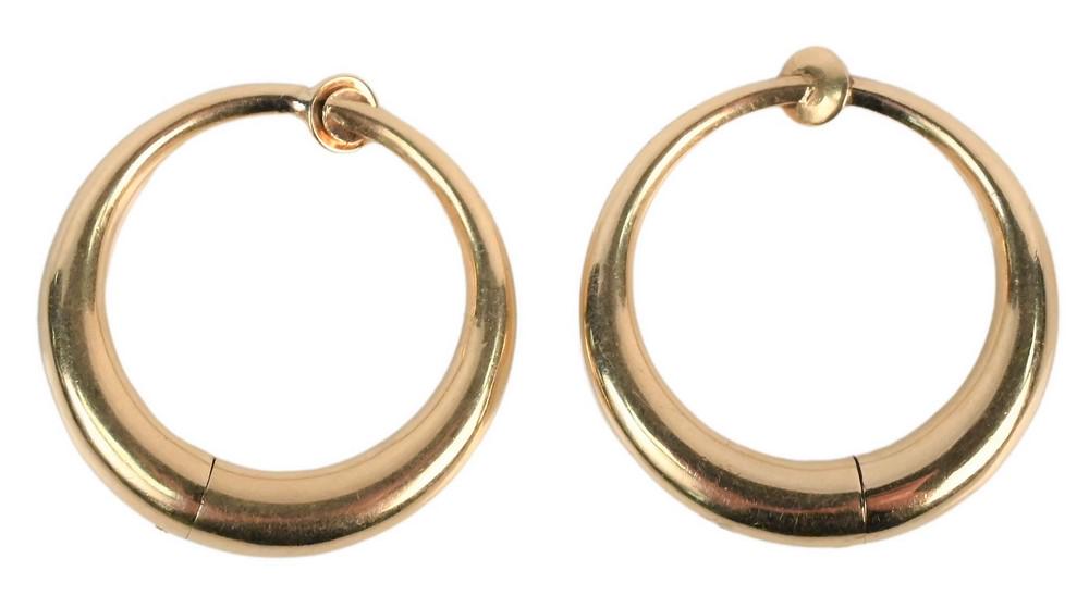 Pair 14 Karat Gold Hoop Earrings, having pressure twist: Pair 14 Karat Gold Hoop Earrings, having pressure twist clips, 8.7 grams.
