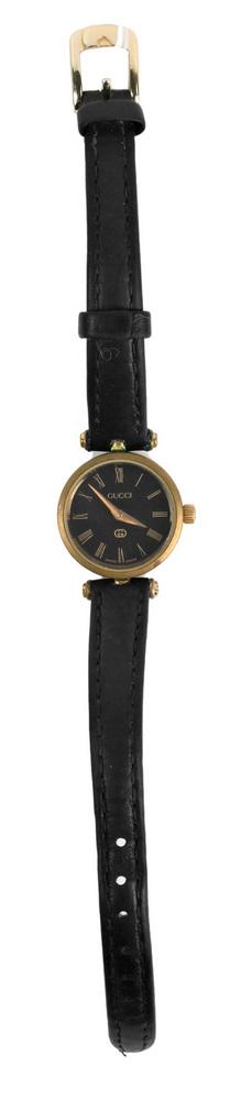 Vintage Gucci Black Enamel Stack Women's Watch, some: Vintage Gucci Black Enamel Stack Women's Watch, some enamel missing, diameter 7/8 inches.