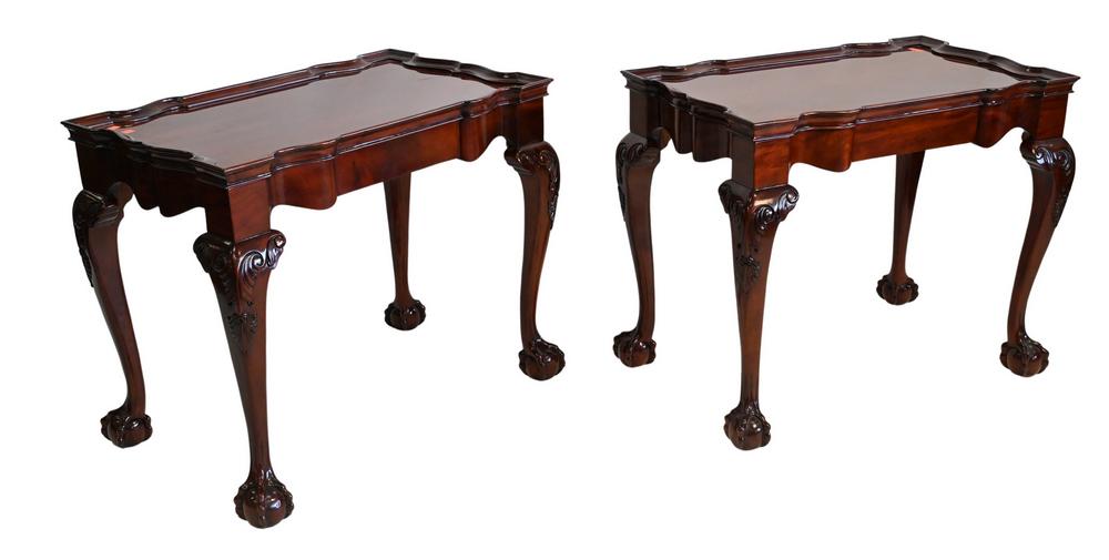 Pair of Mahogany Chippendale Style Tea Tables, having: Pair of Mahogany Chippendale Style Tea Tables, having ball and claw feet, high gloss finish, height 28 inches, top 20 1/2 x 33 1/2 inches.