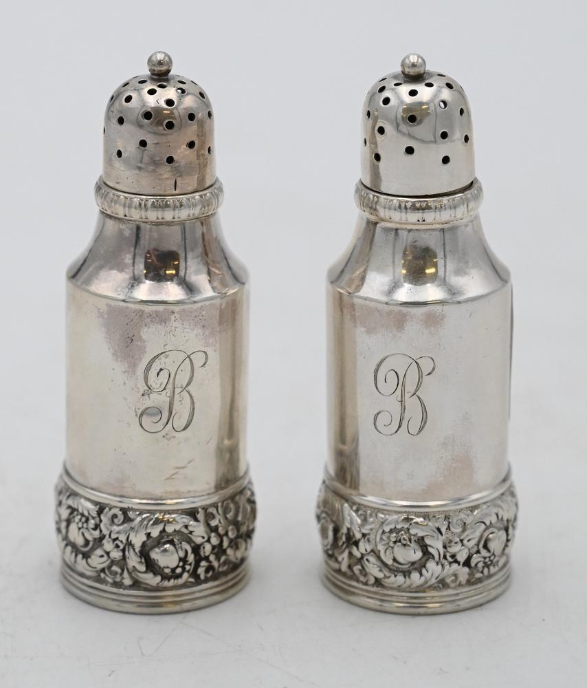 Tiffany & Company Sterling Silver Salt and Pepper,: Tiffany & Company Sterling Silver Salt and Pepper, having repousse bottom band, marked Tiffany & Co. 7303 M 5143, height 3 3/4 inches, 4.1 t.oz, Provenance: Fifty Year Personal Collection of Clocks an