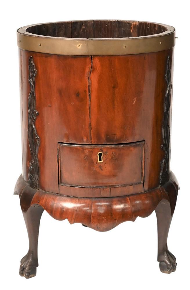 Mahogany Wine Cooler, having brass trim with one drawer: Mahogany Wine Cooler, having brass trim with one drawer on three cabriole legs ending in claw feet, late 18th / early 19th century, height 18 inches, diameter 11 inches.