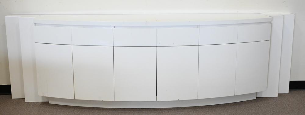 Large Contemporary Custom Ivory Lacquered Sideboard,: Large Contemporary Custom Ivory Lacquered Sideboard, having three drawers over six doors, similar to Enrique - Garcel, height 32 inches, length 108 inches.