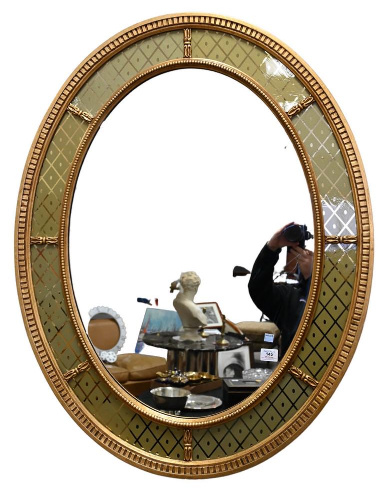 John Widdicomb Oval Mirror, having reverse painted and gilt wood frame, 42" x 33". (1 of 2)