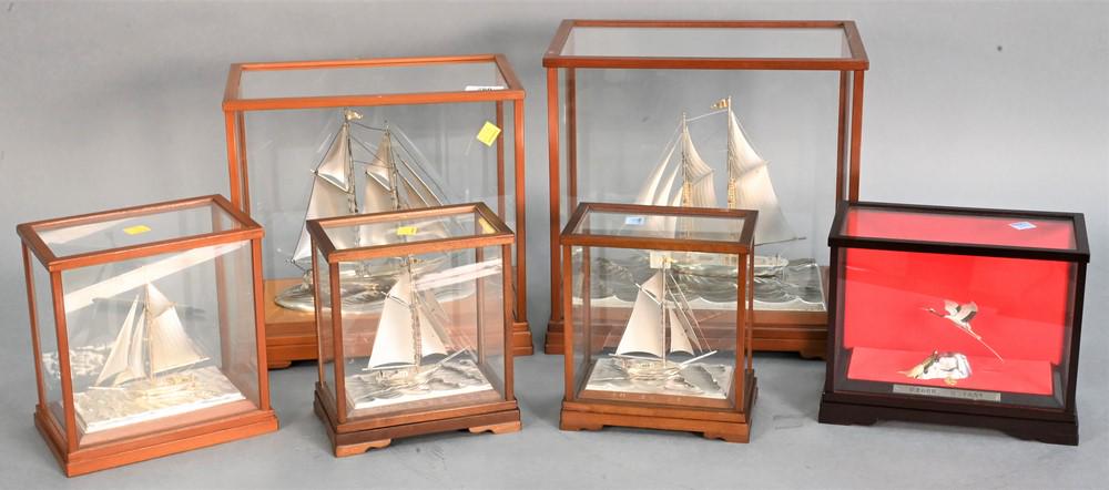 Six Piece Lot, to include five sterling silver sailing boats marked Sterling 960, along with crane (1 of 4)