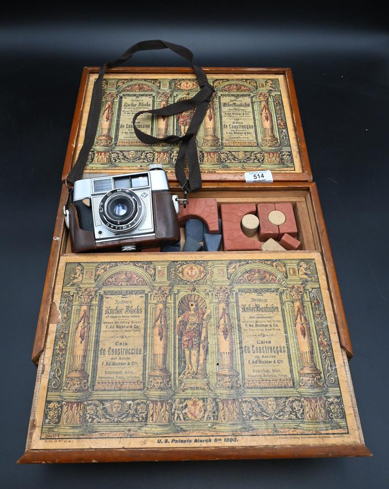Two Richter's Anchor Blocks Stone Building Block Sets, length 14 inches; along with a camera, circa (1 of 5)