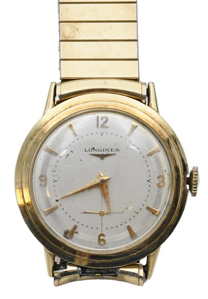 14 Karat Gold Longines Men's Vintage Wristwatch, having second hand, 33.5 millimeters.: 14 Karat Gold Longines Men's Vintage Wristwatch, having second hand, 33.5 millimeters.