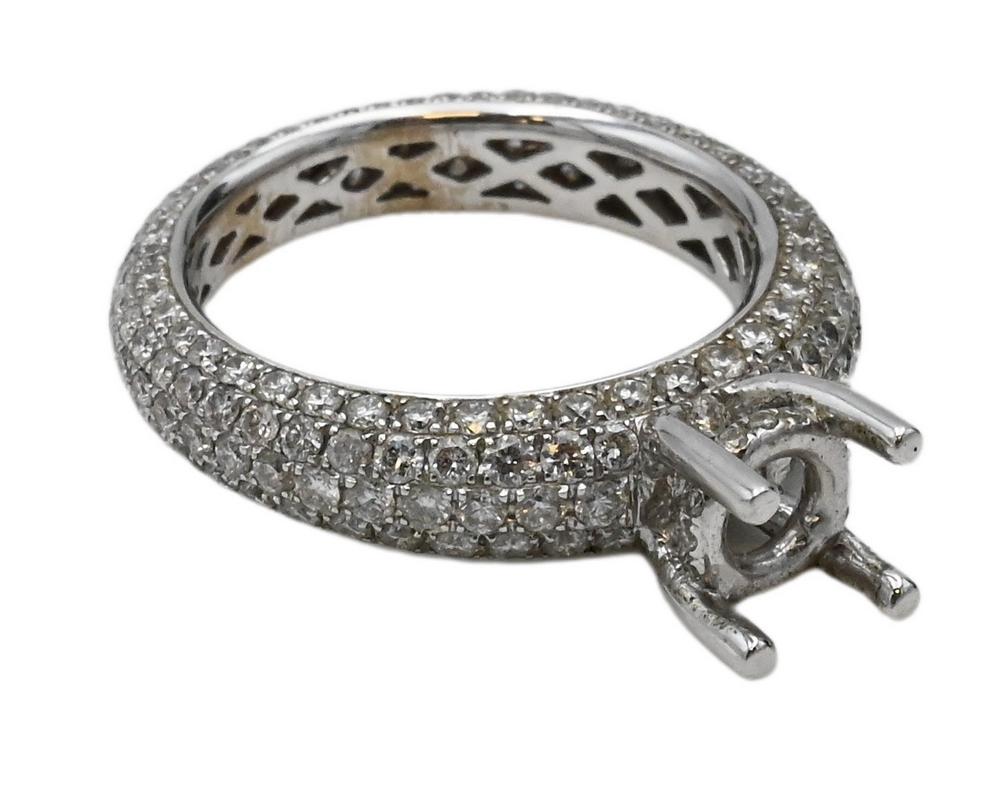 18 Karat White Gold Setting, having five complete rows of diamond surround and filigree interior, no: 18 Karat White Gold Setting, having five complete rows of diamond surround and filigree interior, no center stone, size 7, 6.6 grams.