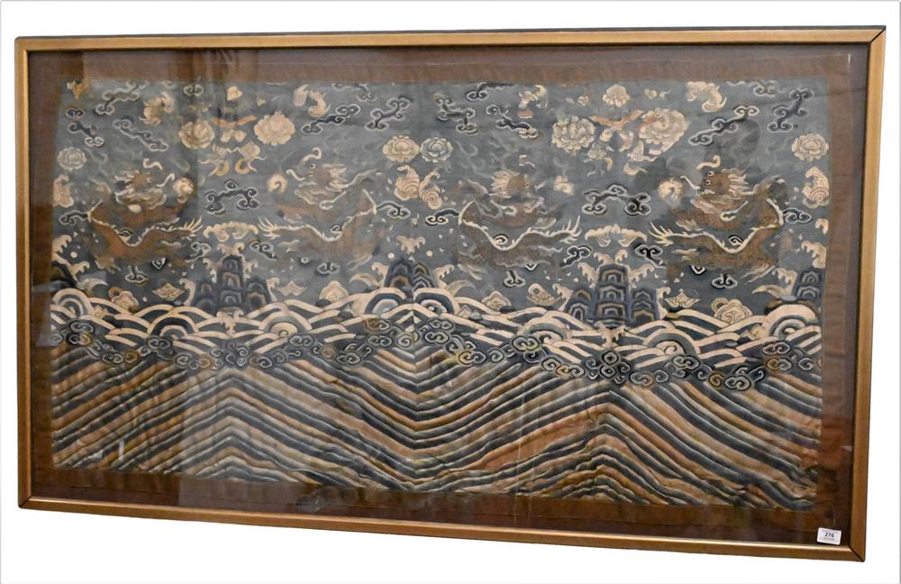 Chinese Embroidered Dragon Textile From Robe, framed and made into a panel having five claw dragons: Chinese Embroidered Dragon Textile From Robe, framed and made into a panel having five claw dragons amongst flaming clouds over crashing wave design 32" x 54". Provenance: Connecticut Personal Collect