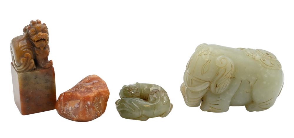 Four Piece Group, to include two carved jade figures, elephant with boy carved from russet celadon: Four Piece Group, to include two carved jade figures, elephant with boy carved from russet celadon jade, a double foo dog figure, along with two soapstone seals, tallest 3 inches.